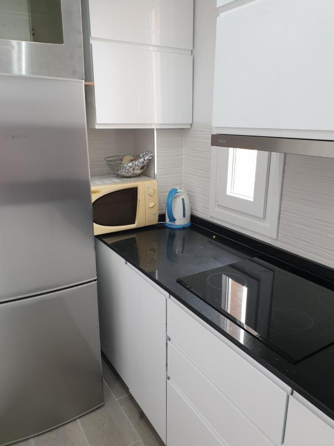 Apartamento Beach First Line Apartment ฟูเอนฮิโรลา ภายนอก รูปภาพ